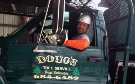 doug sitting in company truck